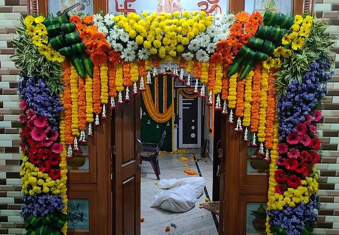 Grand flower entrance with marigold strands
