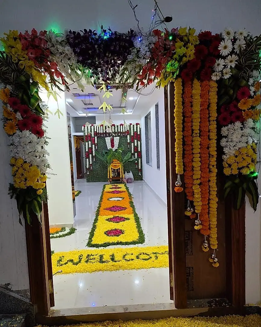 Flower rangoli welcome path into a new home