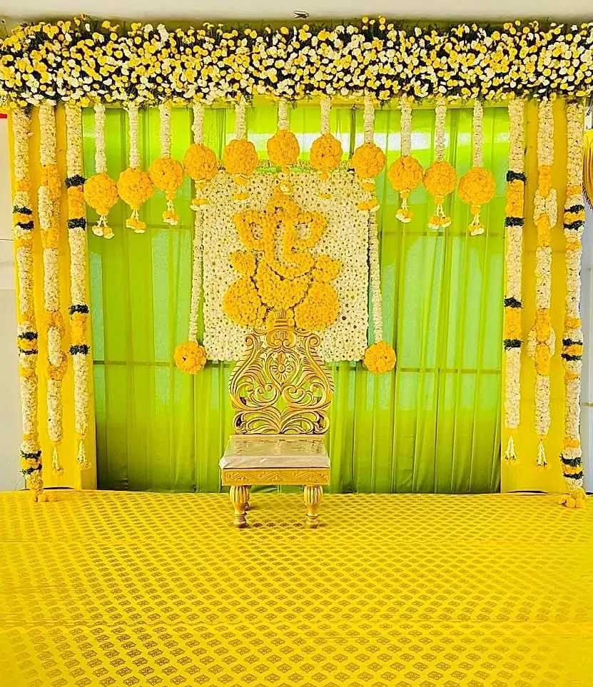 Haldi function backdrop with marigolds by LK Events (5)