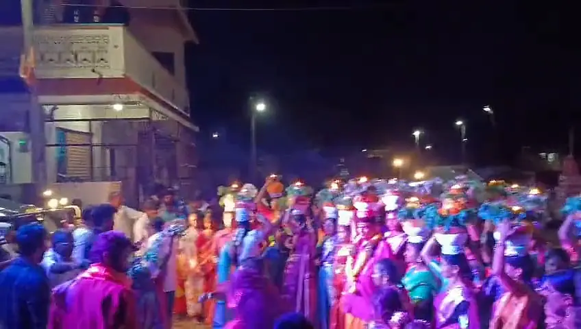 Bonalu night crowd under DJ lights